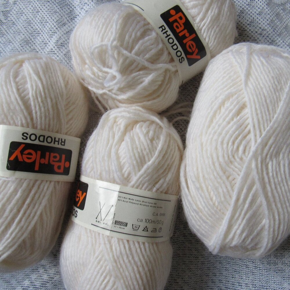 4 Skeins White Parley Rhodos yarn,60% wool, made in Holland, 50g each